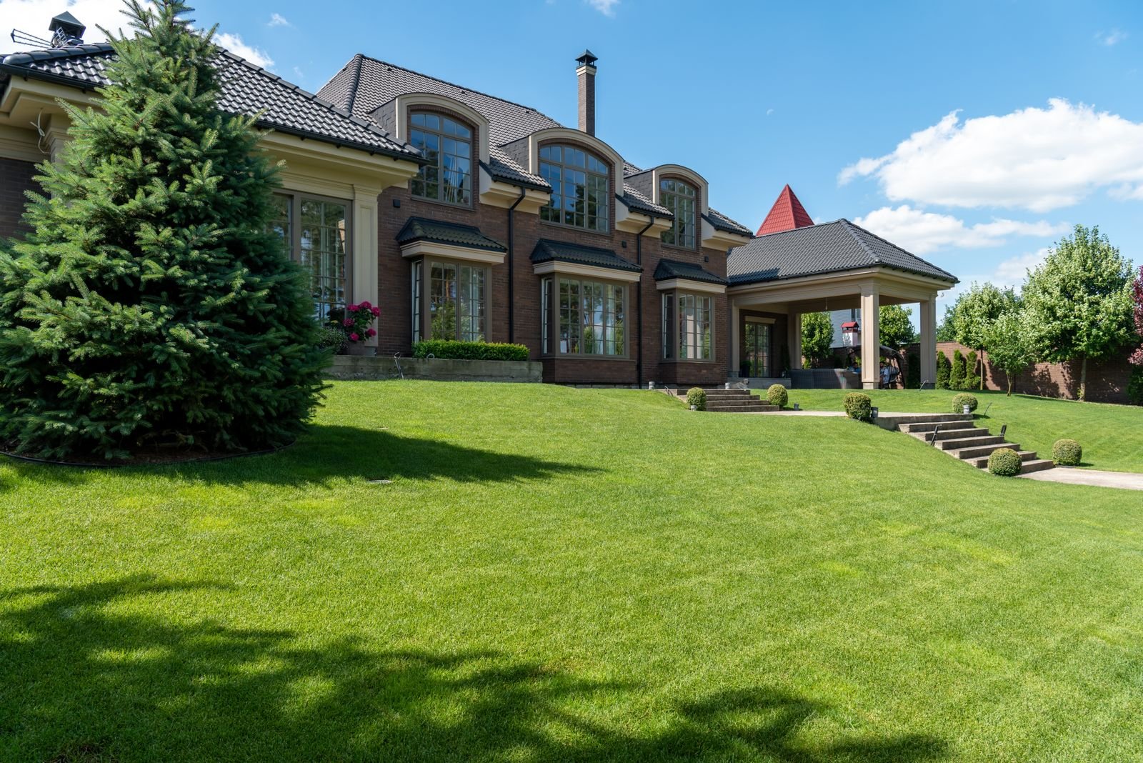Luxury estate with manicured lawn