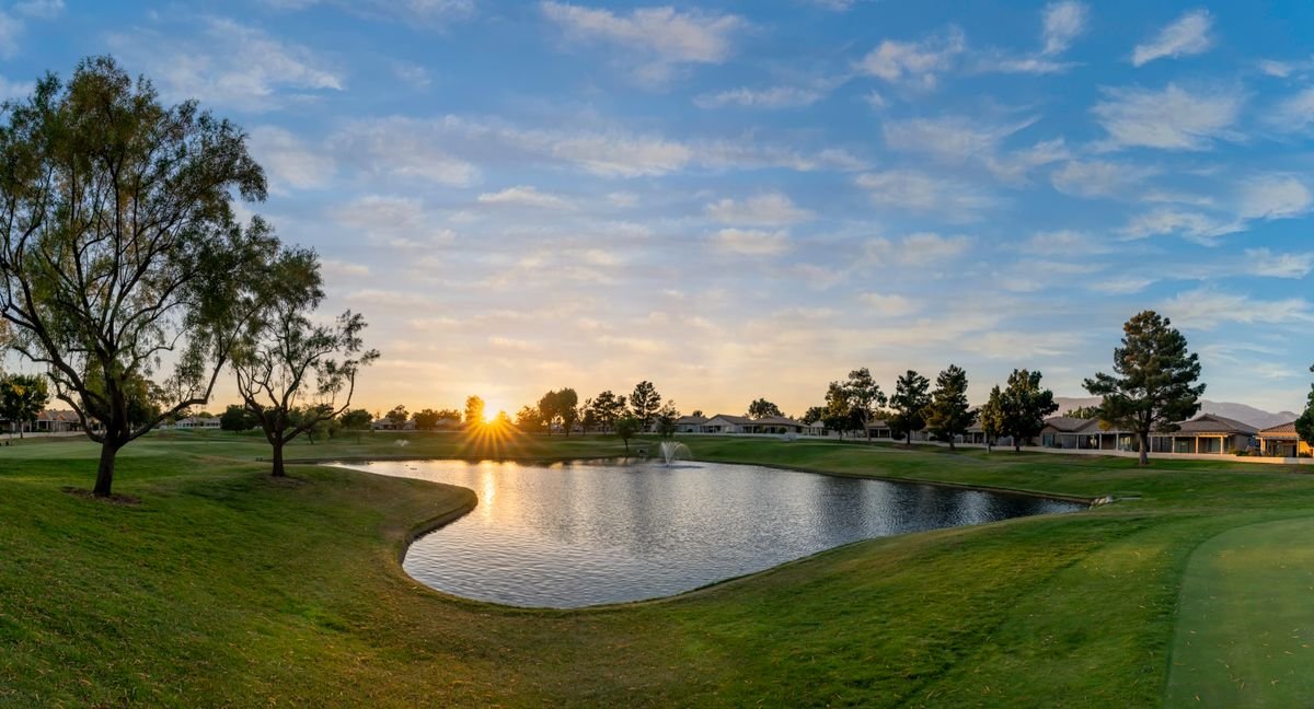 Golf course pond at sunset